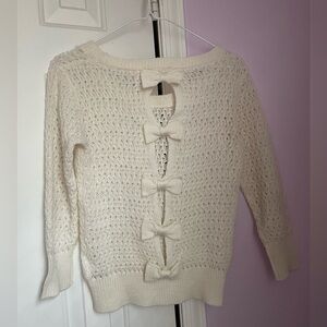 dELiA*s Cream Sweater with Bow Accents